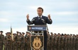 Le président Emmanuel Macron à la base aérienne - © AFP